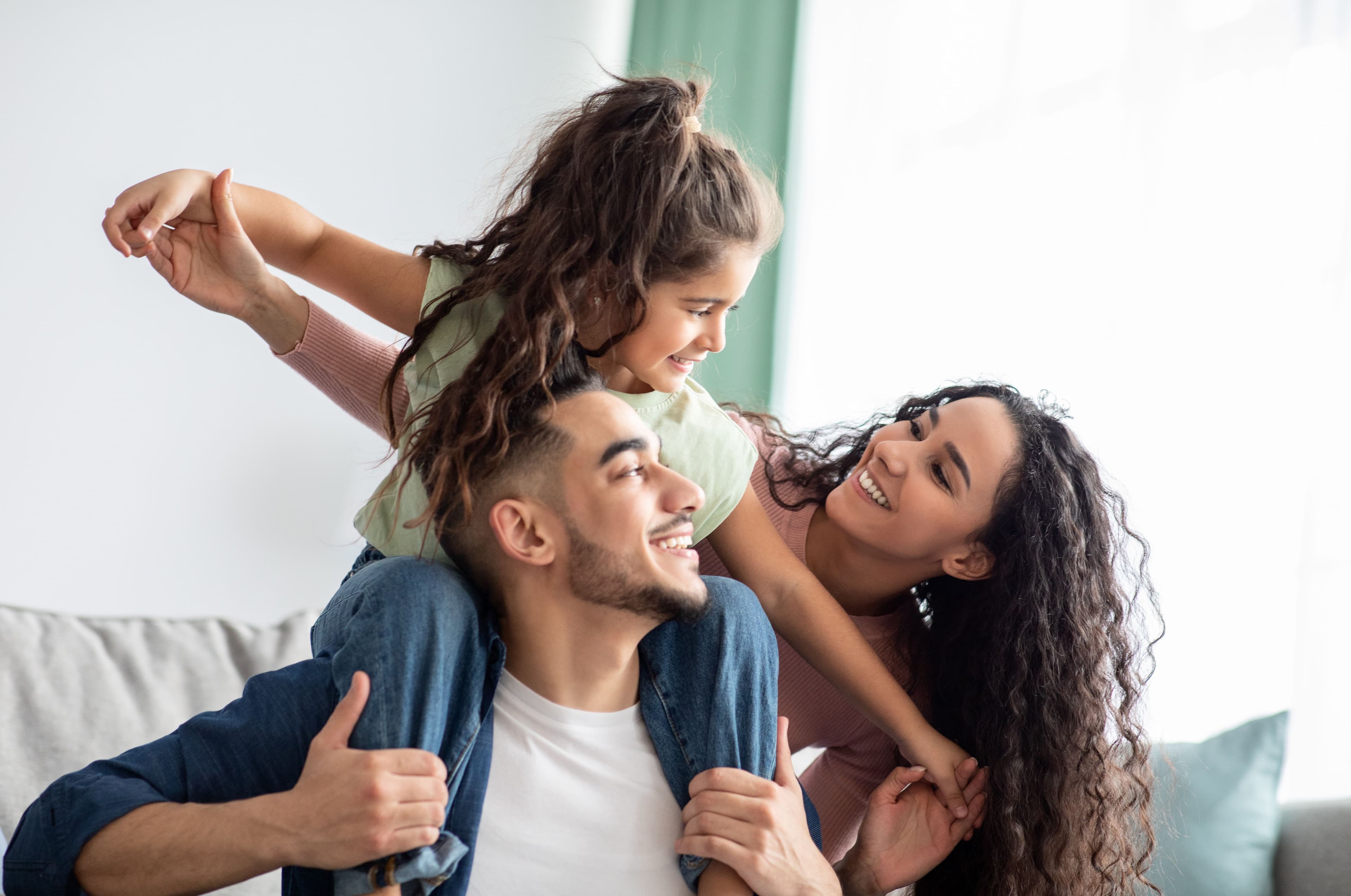 Happy family of three